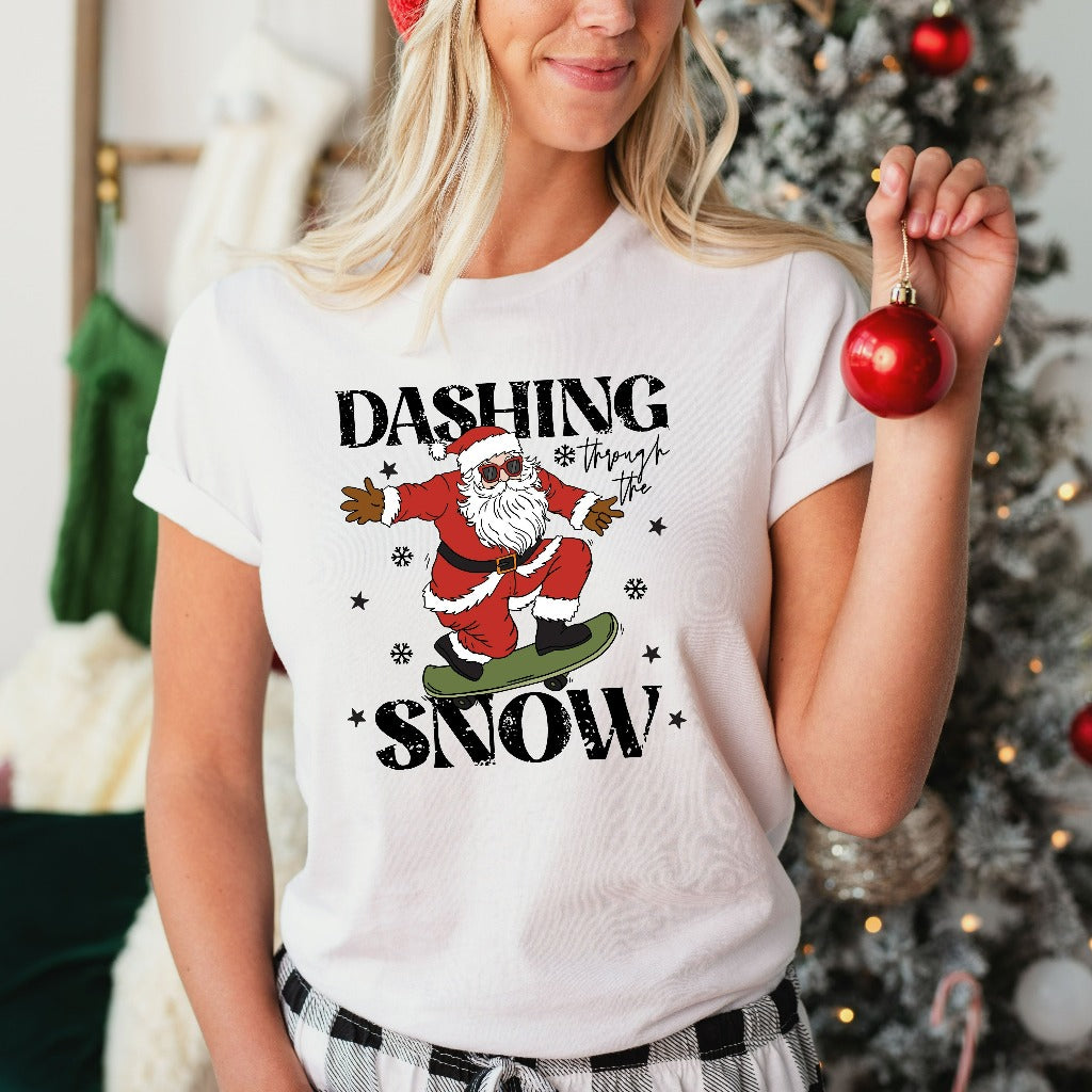 Dashing Through the Snow Shirt, Retro Christmas TShirt, Cute Santa Skateboarding Graphic Tee, Holiday Gifts, Christmas Party Vintage Tee