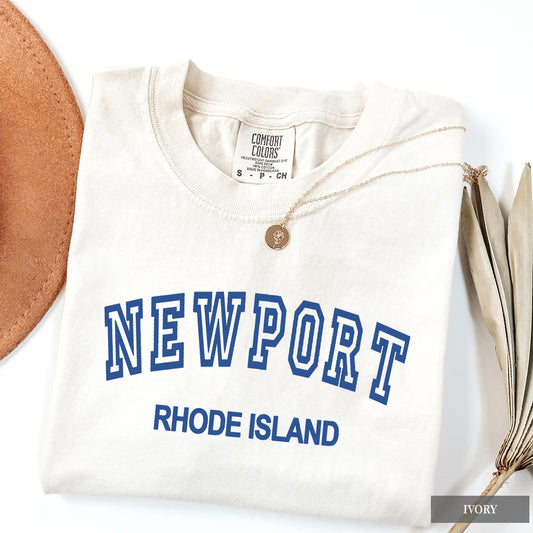 Ivory Comfort Colors shirt with 'Newport Rhode Island' text on a white background
