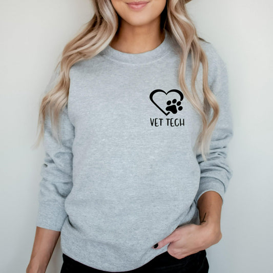 vet tech crewneck sweatshirt, pocket vet tech with heart and paw print, matching veterinary office tshirts, veterinarian shirts, vet tech week graphic tee
