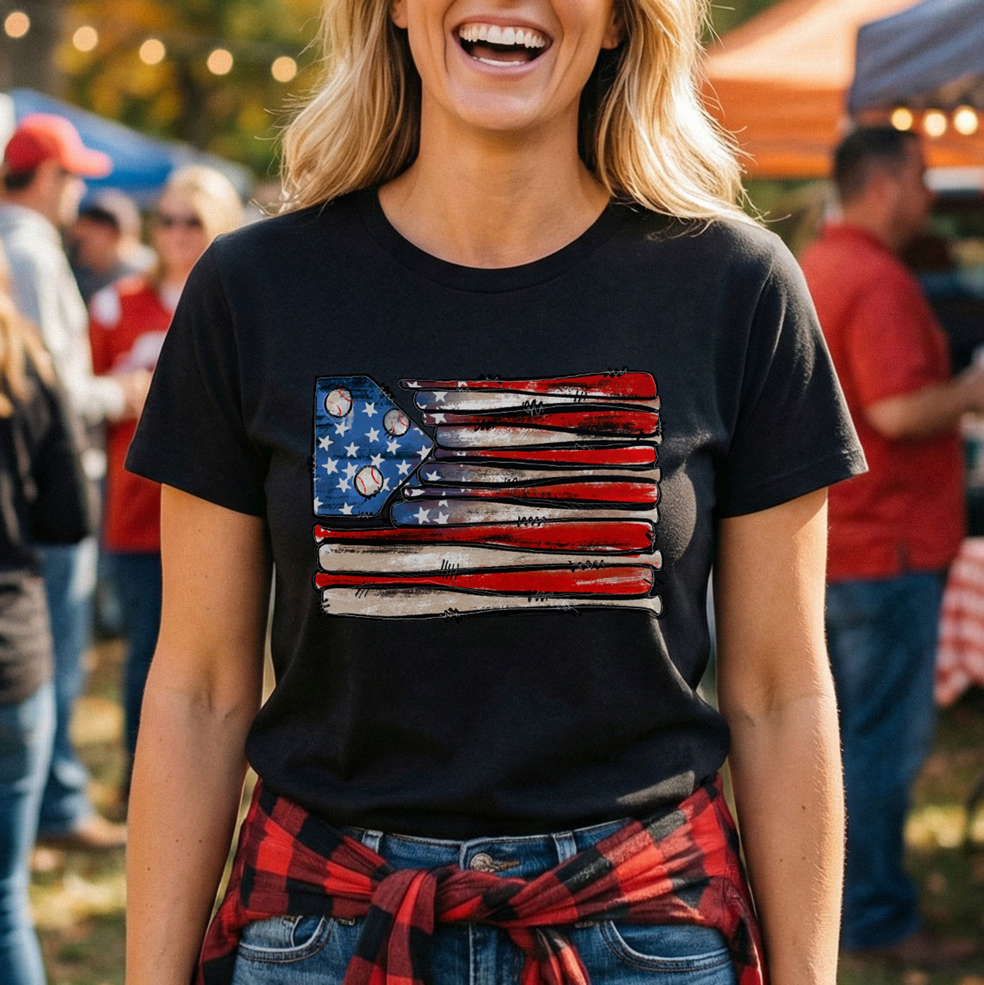 Woman wearing an american flag t-shirt that's made out of baseball bats and baseballs

