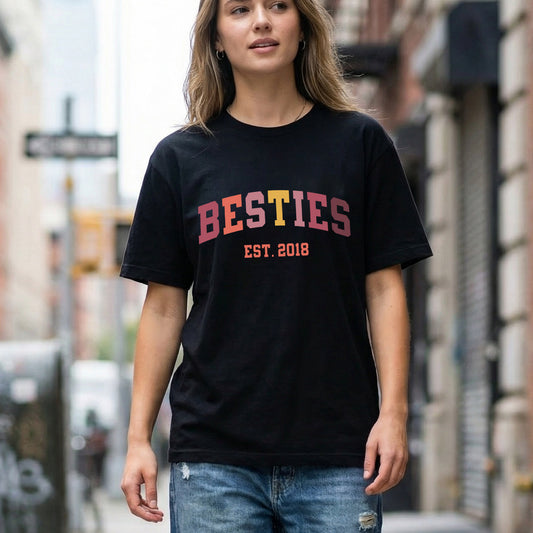 A woman wearing a Besties t-shirt.