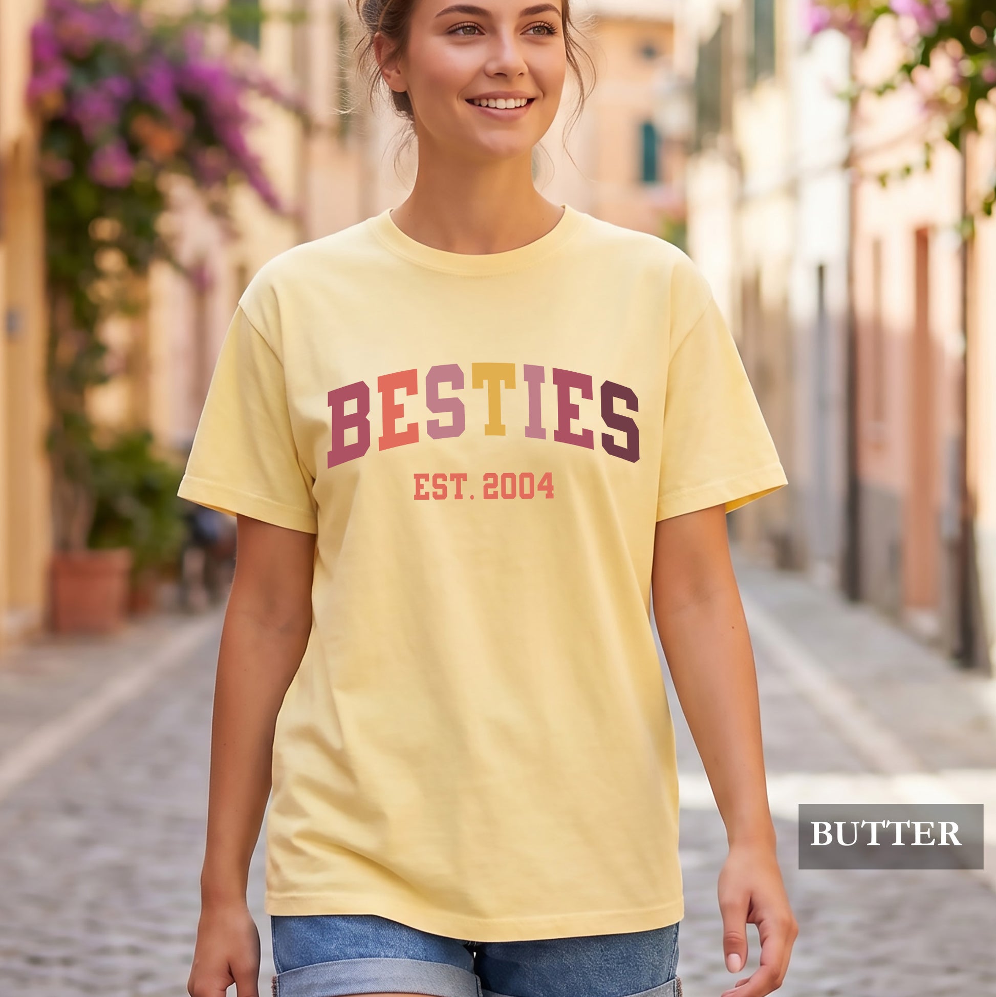 A woman wearing a Besties t-shirt.