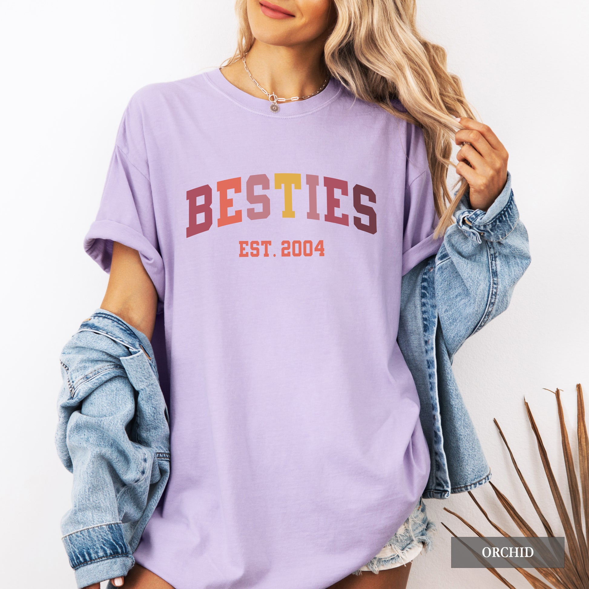 A woman wearing a Besties t-shirt.