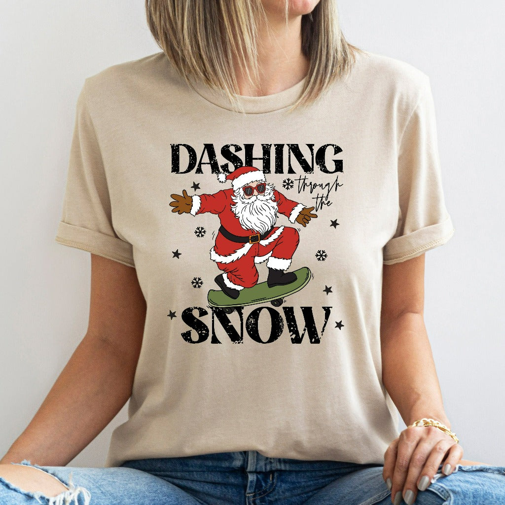 Dashing Through the Snow Shirt, Retro Christmas TShirt, Cute Santa Skateboarding Graphic Tee, Holiday Gifts, Christmas Party Vintage Tee