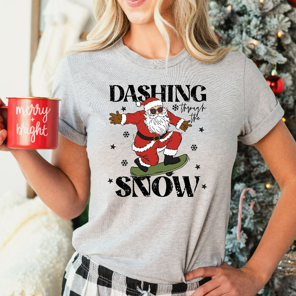 Dashing Through the Snow Shirt, Retro Christmas TShirt, Cute Santa Skateboarding Graphic Tee, Holiday Gifts, Christmas Party Vintage Tee