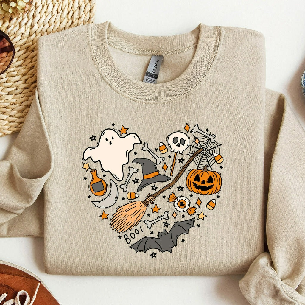 Get into the spooky spirit with this Halloween sweatshirt featuring a playful mix of classic Halloween icons—ghosts, pumpkins, bats, candy, witch hats, and more!