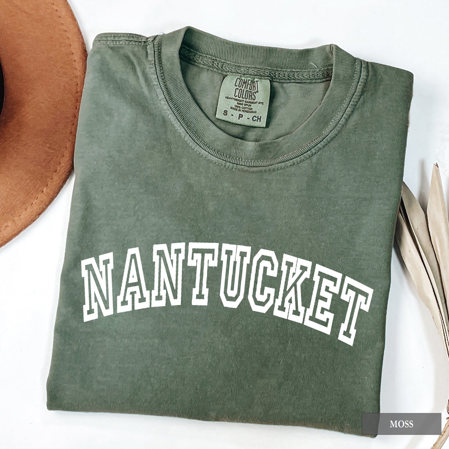A moss comfort colors shirt that says Nantucket.